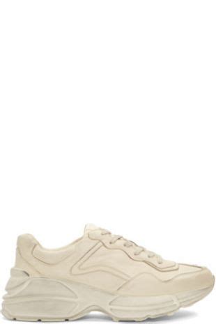 gucci - baskets à effet usé blanches rhyton|Baskets Rhyton en cuir brillant Gucci pour femme.